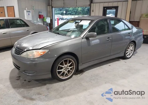 2003 Toyota Camry Le from USA, damaged, VIN 4T1BE32K33U716670
